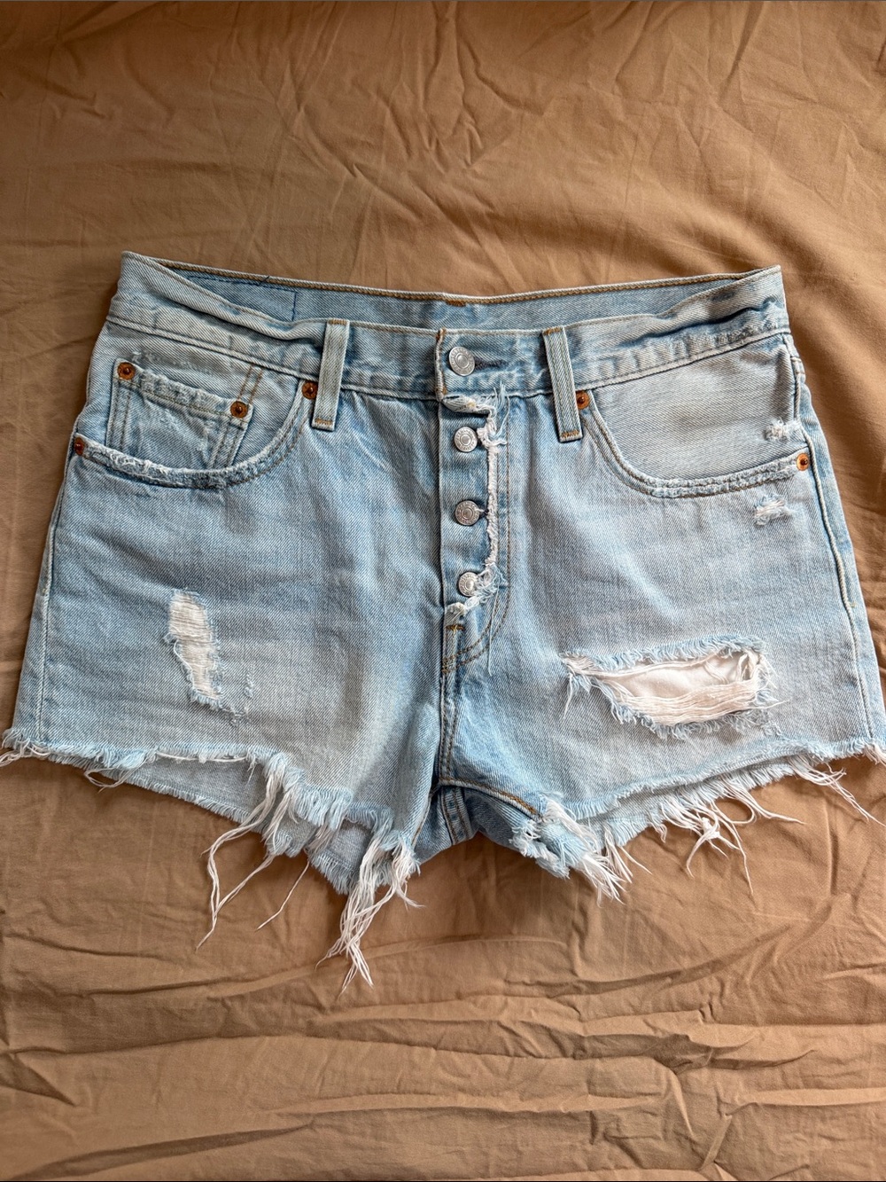 Vintage Levis 501 Light Blue Distressed Denim Button-Fly jeans shorts SZ 25/26